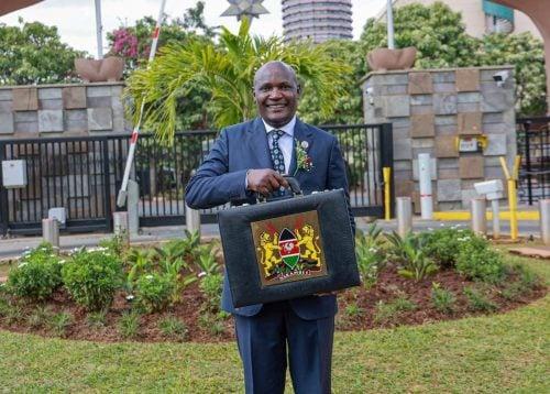 Cabinet Secretary John Mbadi lifts the budget briefcase at the National Treasury ahead of the Budget2026/27 Statement in Parliament.