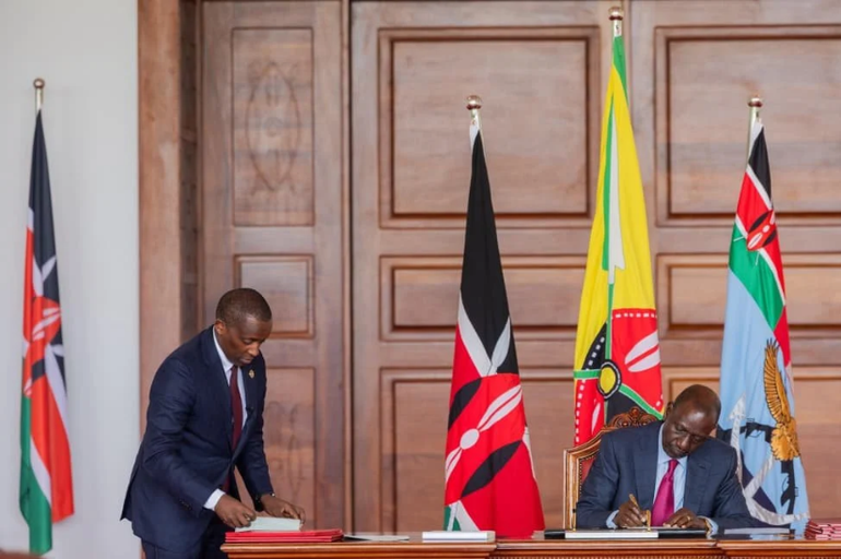 President William Ruto during the signing of the bill into law.(Image:PCS)
