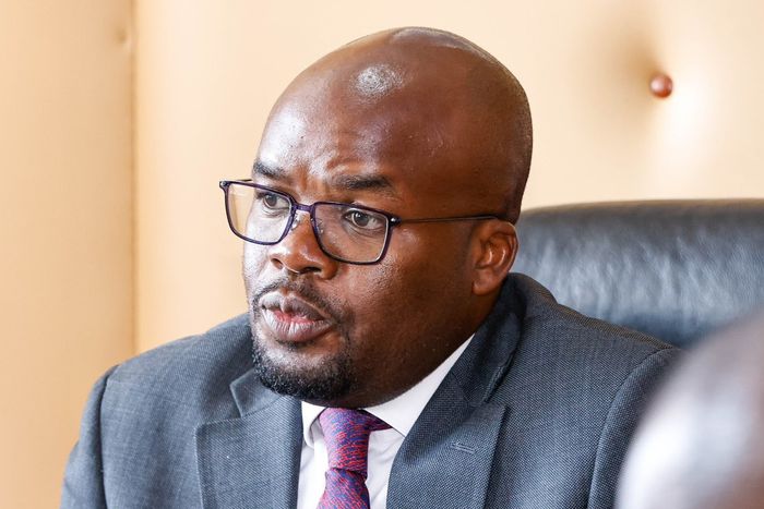 Principal Secretary for Internal Security Dr. Raymond Omollo chairs a meeting in his office