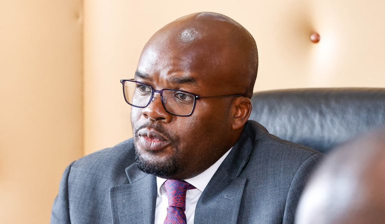 Principal Secretary for Internal Security Dr. Raymond Omollo chairs a meeting in his office