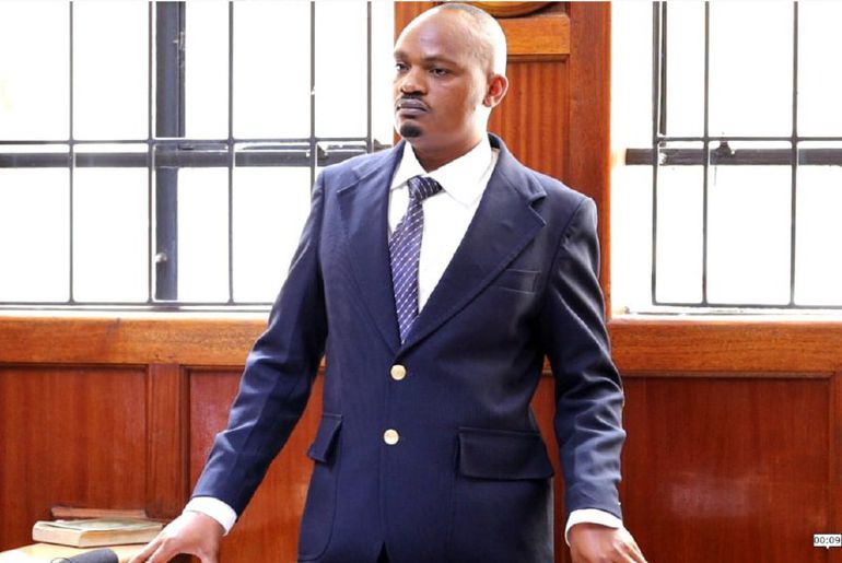 Constable Isaiah Ndumba, the principal suspect in the killing of Rex Masai, taking the stand