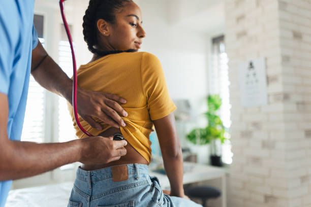 A patient being examined by a doctor