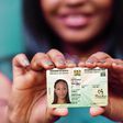 A person holding the new generation Kenyan ID card