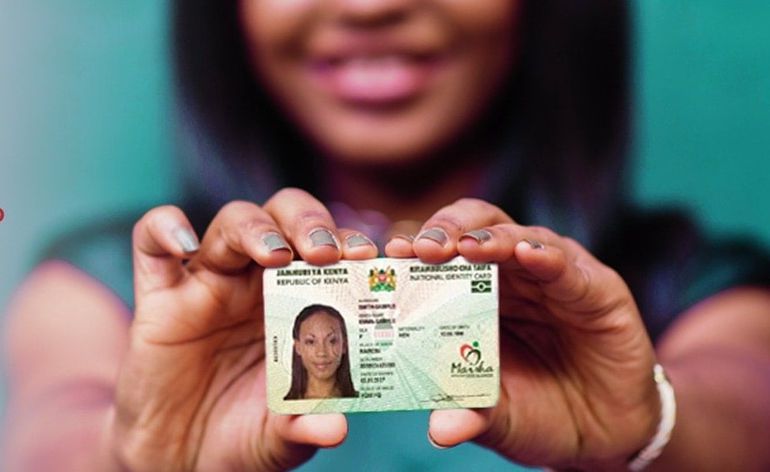 A person holding the new generation Kenyan ID card