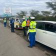 NTSA officers during a crackdown at Salgaa along Nakuru -Eldoret highway.
