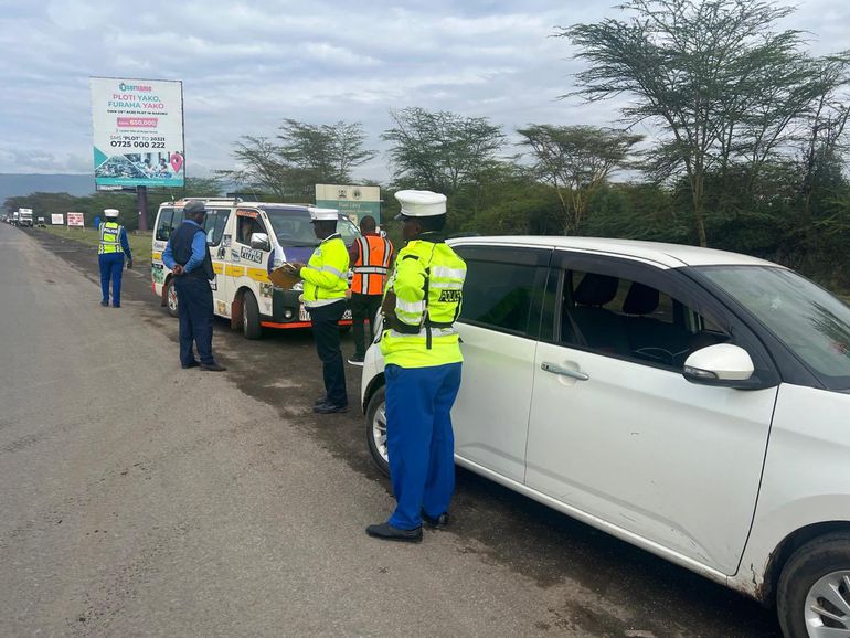 NTSA officers during a crackdown at Salgaa along Nakuru -Eldoret highway.