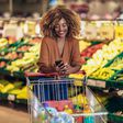A black woman shopping at a supermarket
