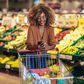 A black woman shopping at a supermarket