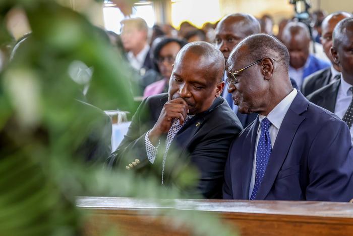 Deputy President Kithure Kindiki and former Meru Governor Kiraitu Murungi during the requim mass of Murungi's daughter Anita