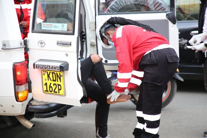A Red Cross  Kenya Volunteer treating an injured person during recent demonstrations on June 17 2025