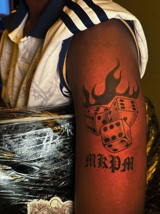 A lady displays an abstract arm tattoo (Image: Files)