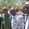 Former President Uhuru Kenyatta and Oburu Odinga at the grave of Raila Odinga in Bondo