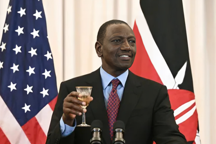 President William Ruto holds his glass for a toast during a luncheon in in Washington, DC, on May 24, 2024.