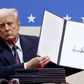 President Donald Trump signs several Executive Orders