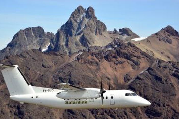 A DeHavilland Dash 8 plane branded Safarilink Aviation