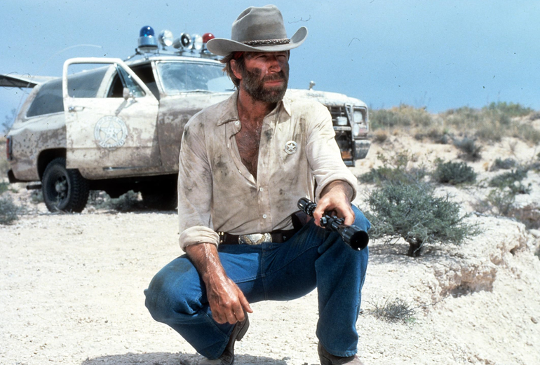 Chuck Norris in Lone Wolf McQuade (1983) as J.J. McQuade, a solitary Texas Ranger and former Marine