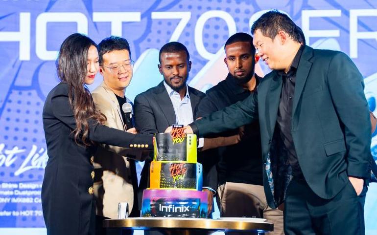 Brand Manager, Channel Manager, Marketing Manager and Key Partners during the cake cutting ceremony
