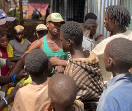 Kenyan content creator Duty Boy Stylish during a charity event in Kibra. (Image: Duty Boy Stylish)