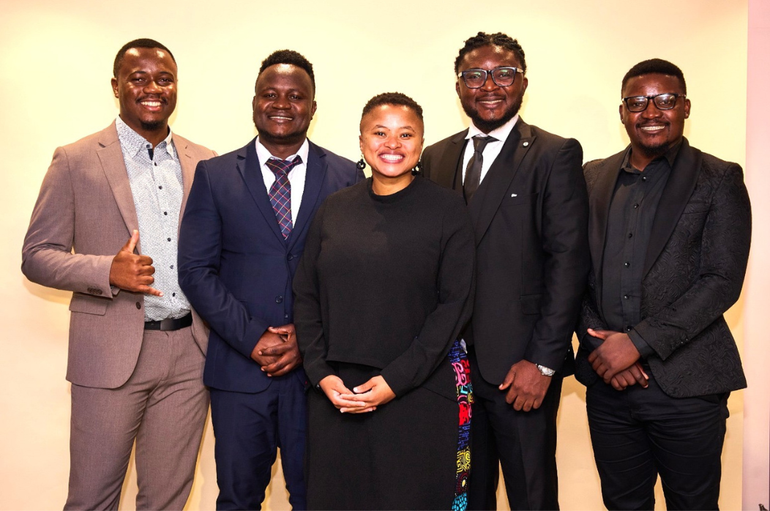 The four finalists with Judy SIkuza, CEO of The Mandela Rhodes Foundation, from left to right: Nyasha Mashanda, Odwour Midigo (winner), Judy Sikuza, Emmanuel Valentino and David Chapoloko