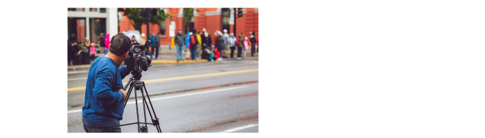 An image of a media personel taking pictures
