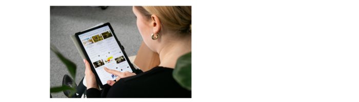 An image of aperson scrolling through social platforms on a tablet