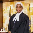 Linus Kaikai dons the advocate's gown and wig after admission to the Bar as an advocate of the High Court of Kenya