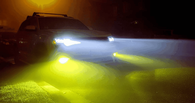 A vehicle fitted with yellow LED fog lights, these sit lower on the bumper than standard headlights and improve visibility in rainy conditions