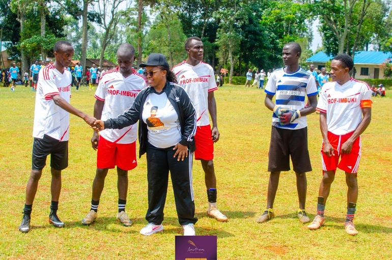 Dr. Amakove Wala interacts with football players during the inaugural Vihiga County Champions Cup tournament in July 2026 (Image: Files)