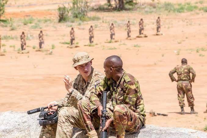 A British and Kenyan soldier catch up during an undated joint Kenya-UK military training exercise (Image: Files)