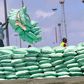Dockworkers off-loading sugar at the port of Mombasa