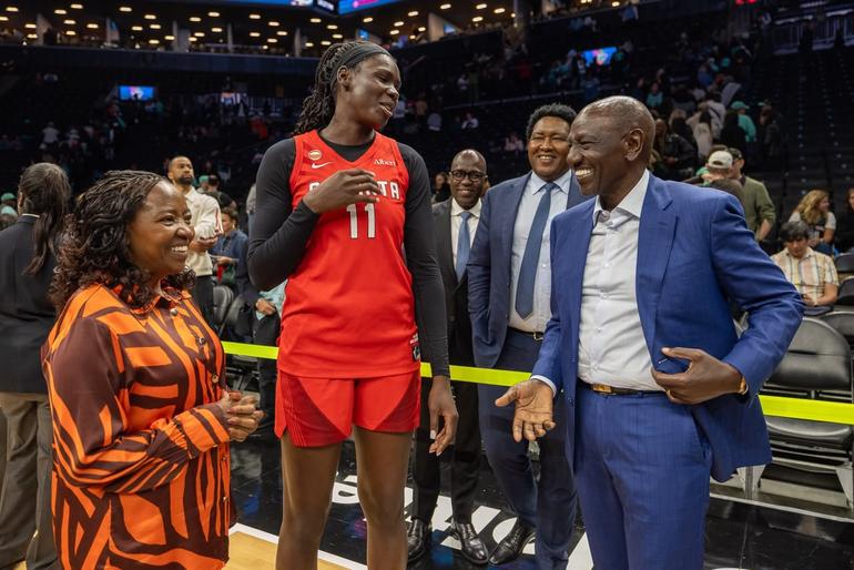 President William Ruto and First Lady Rachel Ruto interact with WNBA star Madina Okot during Atlanta Dream's game in Brooklyn, New York.