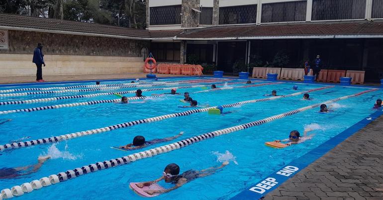 Primary School Year 4 learners at Oshwal Academy making a massive splash and mastering their freestyle kicking technique during a swimming lesson (Image: Files)