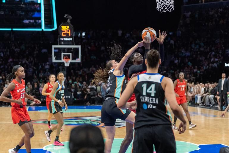 WNBA star Madina Okot in action