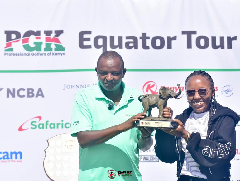 Winner Simon Chege and Nazreen Wangari Safaricom Representative