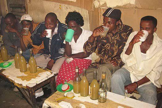 Revelers catch a pint of Muratina at a social joint after a Kiambu court legalized it (Image: Files)