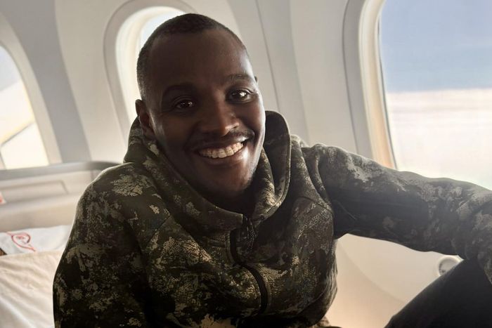 Musician and police officer Samidoh aboard a plane
