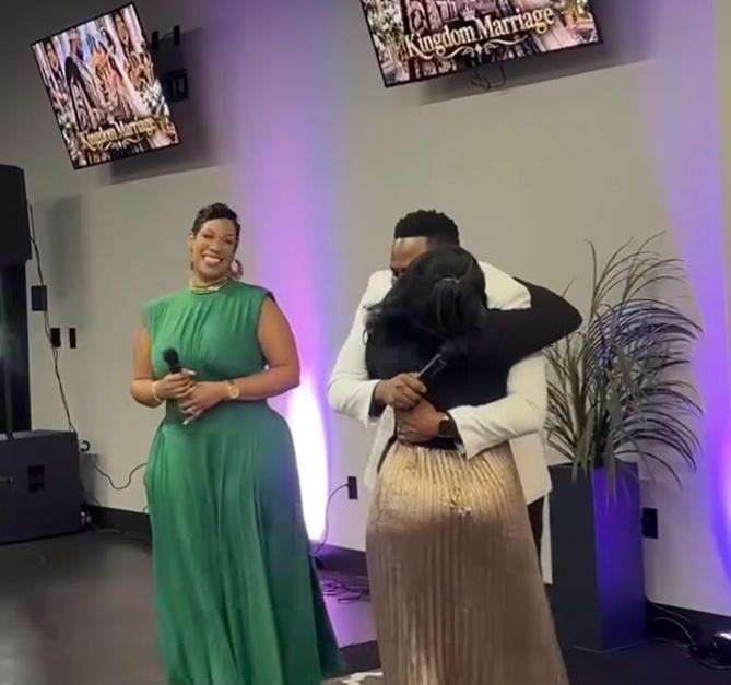 Minister Shakayla was introduced to the congregation, then walked forward to embrace both Israel and Lydia before addressing the church.