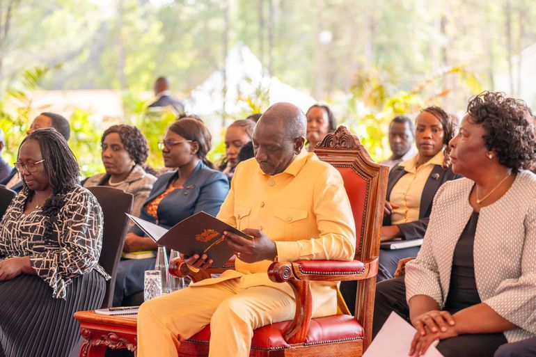 President William Ruto receiving the report of the Technical Working Group on Gender-Based Violence Including Femicide, State House, Nairobi.