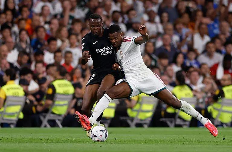 Job Ochieng battles for the ball against Denzel Dumfries at the Santiago Bernabéu. Ochieng started the match for Real Sociedad, who suffered a 4-1 defeat against Real Madrid (Image: Files)