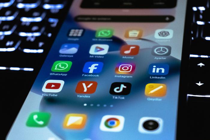 File image of a phone screen displaying social media icons