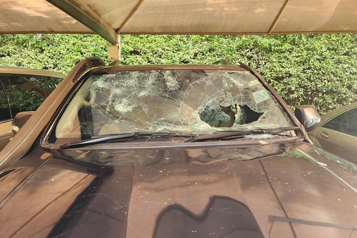 A vehicle in Rigathi Gachagua's convoy damaged during an attack at a funeral in Limuru