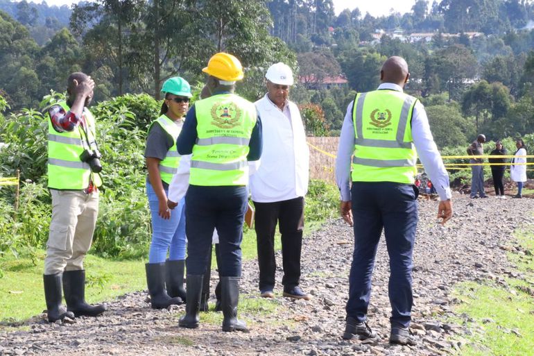 DCI officers at Makaburini Cemetery in Kericho