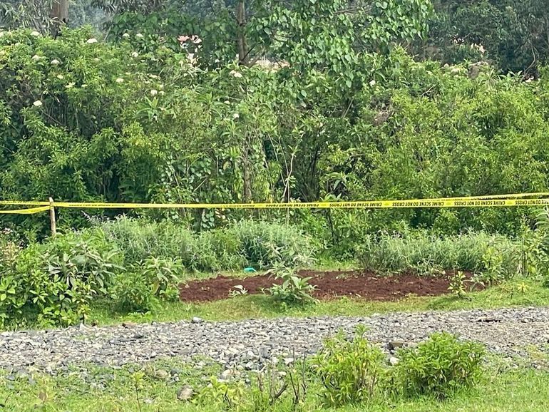 A section of Makaburini Cemetery in Kericho, cordoned off by Police for investigations