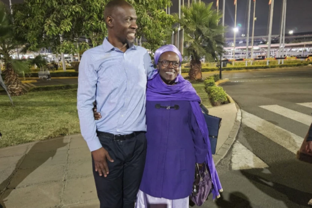 Stephen Munyakho embraced by his mother at the Jomo Kenyatta International Airport when he arrived from Saudi Arabia