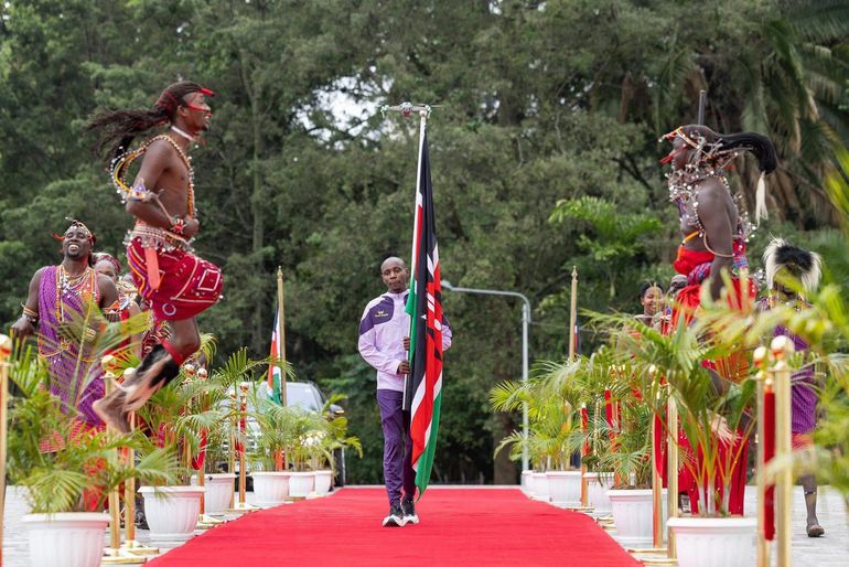 Athlete Sebastian Sawe when he presented the Kenyan flag to President William RutoState at State, House