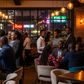 An AI-generated image of Kenyans drinking alcohol at a modern bar.