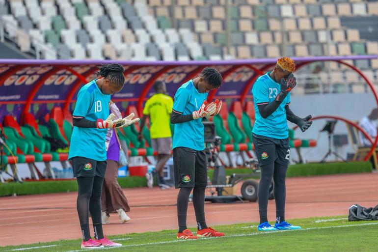Harambee Starlets goalkeepers take a moment minutes before kick-off of their WAFCON 2026 clash against Senegal (Image: Files)
