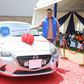 Winnie Dorah, the grand prize winner of a brand-new Mazda Demio in TECNO Kenya & Christmas Fiesta campaign, receives the car keys from Scott Liu, TECNO Kenya Country Manager, during the official handover ceremony at Garden City Mall, Nairobi.