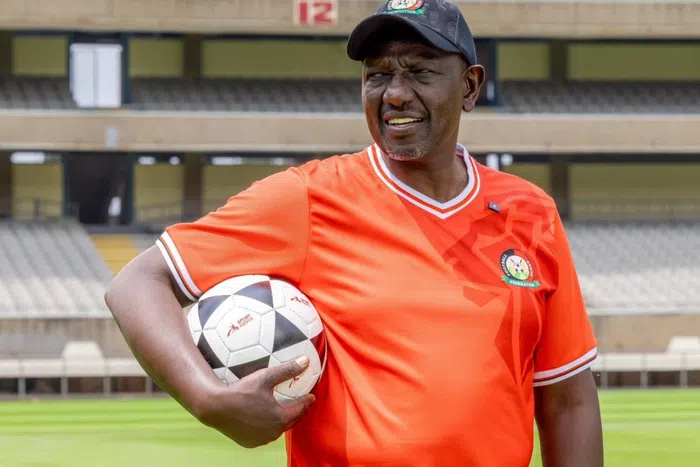 President William Ruto in a Harambee Stars jersey.