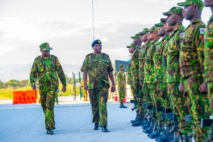 Inspector General of Police Doglas Kanja inspecting a National Police Service guard of honor